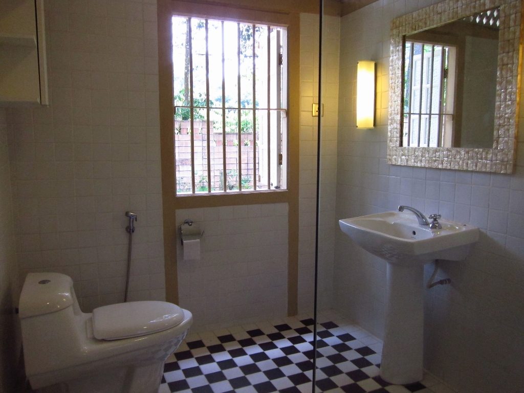 Sink and toilet in one of the bathrooms