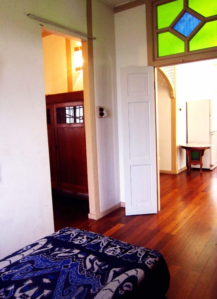 The attached small bedroom is connected to the first bedroom by an open doorway