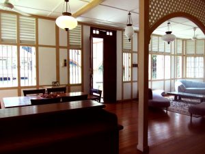 View of living room, dining room and front door from kitchen